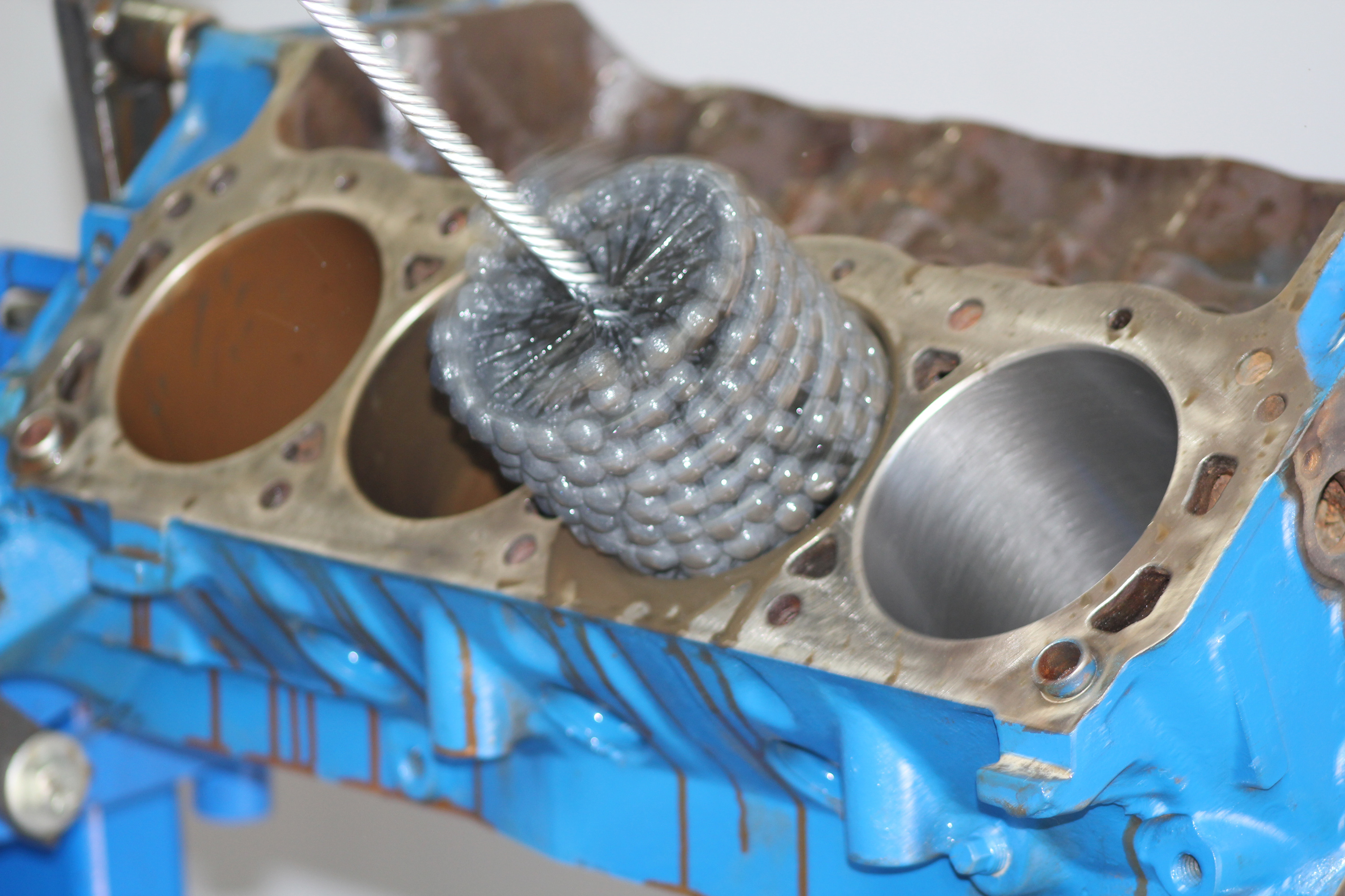 Flexhone tool being used on engine block cylinder